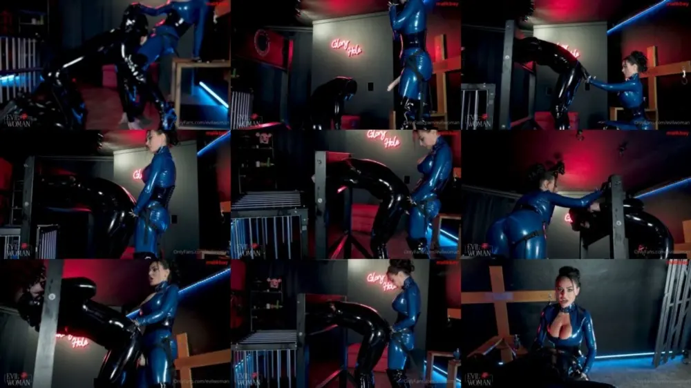 Evil Woman — Rubber gimp destroyed in the stocks [FullHD 1920p]
