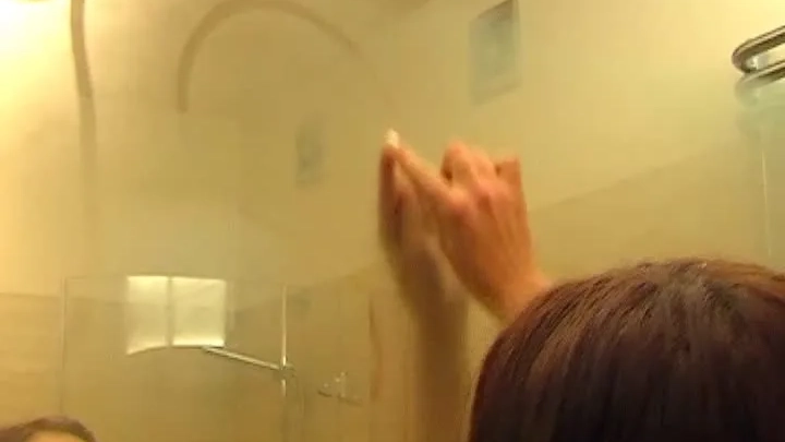 Mature MILF Teases While Drying Off with Towel